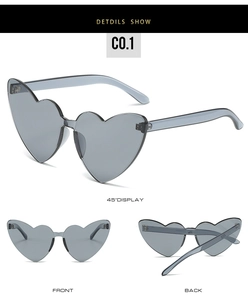 Détails de lunettes de soleil cœur sans monture gris fumé avec un design monobloc