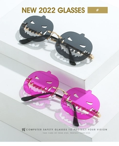Detail of pumpkin-shaped rimless sunglasses with gold metal temples and shadow effect