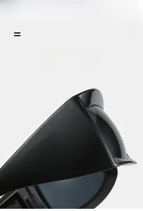 Detail of lightweight sunglasses featuring super elastic frame and grey tinted lenses