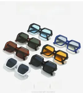 Detailed flat lay of stylish polygonal oversized sunglasses in various frame colors