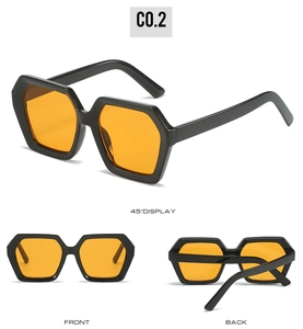 Three-way view of bold black hexagonal oversized sunglasses with bright orange lenses