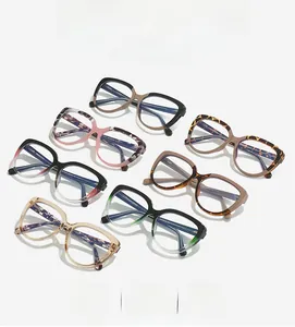 Detailed close-up showing seven stylish cat-eye glasses with diverse floral and leopard patterns