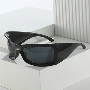 Modern oversized wrap-around sports sunglasses with glossy black frames and dark lenses