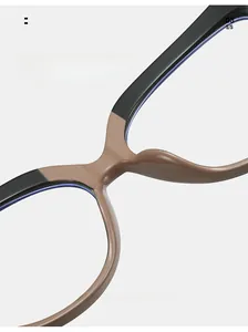 Detail of integrated comfortable nose pads on black and brown cat-eye TR glasses