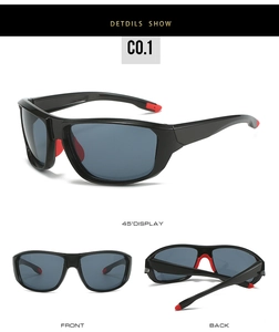 Close-up of cycling sunglasses with black frame and red anti-slip rubber nose pads