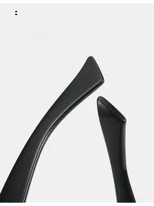 Detail of curved black glossy sunglasses legs designed for comfortable ergonomic fit