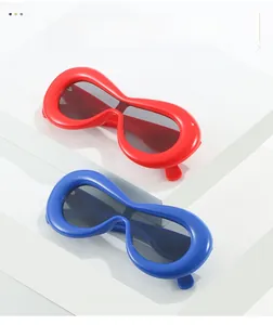 Detail of red and blue Y2K infinity shape oversized wraparound fashion sunglasses