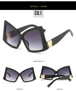 Détails de lunettes papillon surdimensionnées avec verres dégradés violets et métal