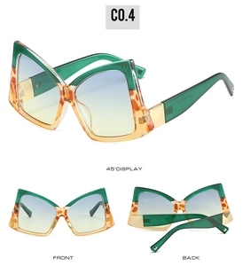 Vues détaillées de lunettes papillon vert et léopard avec verres dégradés bleu-jaune