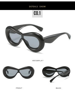 Three perspectives of Y2K wrap sunglasses with bold oval frames and streamlined temples