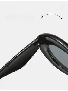 Macro detail of high-quality metal hinge on Y2K oversized black sunglasses