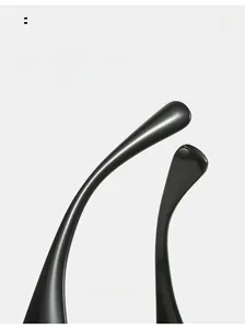Detail of high-gloss curved mirror legs on ergonomic Y2K wrap-around sunglasses