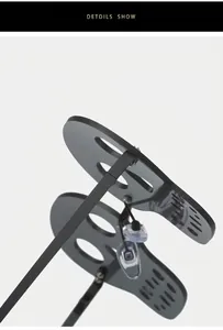 Détail de lunettes de soleil tête de mort sans monture avec pont métallique