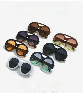 Detailed close-up of retro double-bridge oversized sunglasses in assorted colors