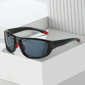 Fashionable cycling sunglasses in black and red sport frame with dark grey lenses