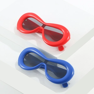 Y2K fashion wrap sunglasses with oversized wavy frames in vibrant red and deep blue colors