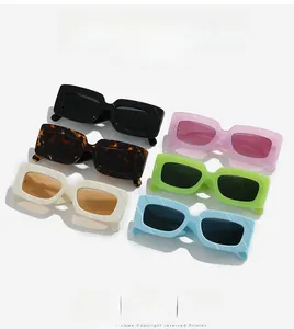 Detail of retro rectangular sunglasses with diamond-carved textures in various colors
