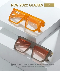 Flat top square frame sunglasses in transparent orange and translucent dark grey finish