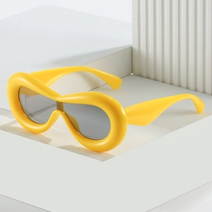 Y2K wraparound oversized bright yellow sunglasses with thick frames and grey lenses