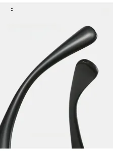 Detail of high-gloss black curved sunglass arms designed for comfortable daily wear