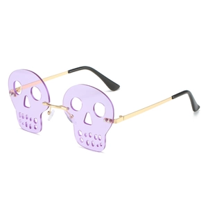 Paarse randloze zonnebril in de vorm van een schedel met gouden pootjes voor Halloween