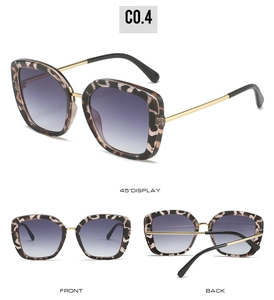 Detail view of square leopard print sunglasses with gradient lenses and gold metal temples