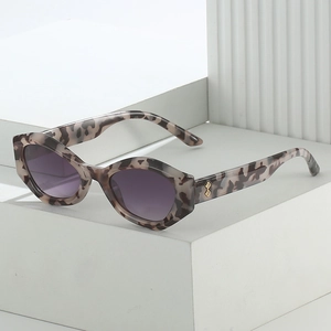 Retro leopard print geometric sunglasses with purple lenses and gold diamond accents