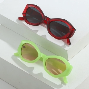 Retro small frame geometric sunglasses with transparent red and neon green frames