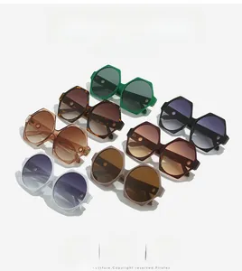 Detailed grid of oversized polygonal sunglasses in seven trendy assorted colors
