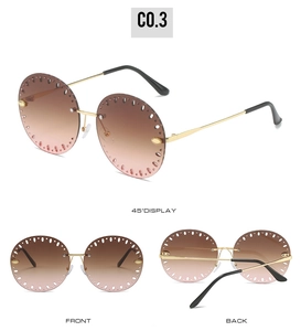 Vue triple de lunettes de soleil rondes sans monture avec verres dégradés bruns et branches or