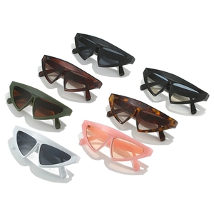 Fashion geometric triangle cat eye sunglasses set in multiple colors on white backdrop