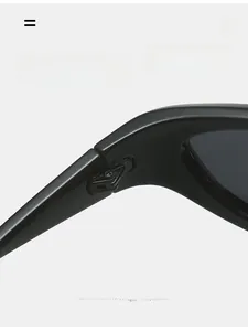 Macro shot of durable metal reinforced hinge on black polarized sports sunglasses