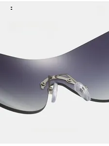 Detail of soft transparent nose pads and silver metal frame on Y2K gradient sunglasses