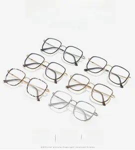 Detailed display of square oversized fashion glasses in black, gold, silver and leopard frames