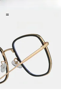 Detail view of flexible gold temples and soft silicone nose pads on square frames