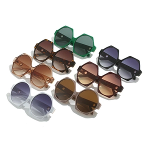 Set of trendy oversized polygonal sunglasses in multiple colors with gradient lenses