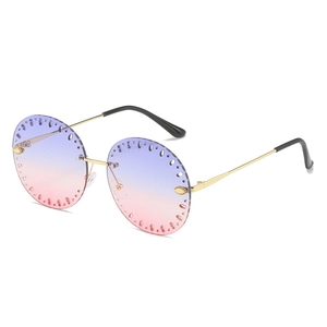 Lunettes de soleil rondes sans monture avec verres dégradés violets et monture dorée