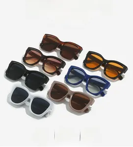 Detail shot of vintage square sunglasses in seven assorted colors with thick frames