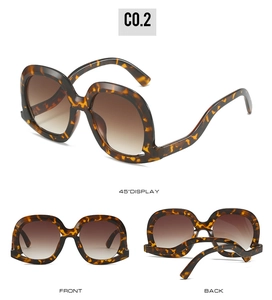 Trois perspectives de lunettes de soleil oversize écaille avec verres dégradés bruns