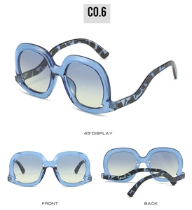 Vues détaillées de lunettes de soleil bleu clair avec verres dégradés et branches à motifs