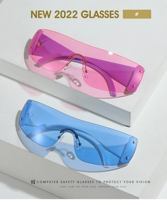 Detail of Y2K futuristic wrap around sunglasses with stylish metal rivets and large frames