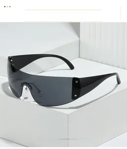 Detail of Y2K shield sunglasses with silver star accents on black wide temples