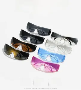 Row of colorful Y2K oversized rimless sunglasses with metal rivets in various lens colors