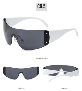 Detail view of white Y2K oversized sunglasses with silver star studs and dark lenses