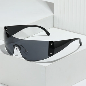 Y2K fashion oversized wrap sunglasses with black frame and silver star detail