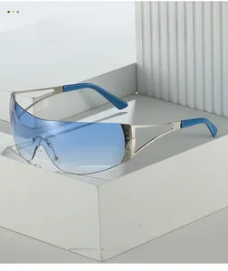 Close-up of blue gradient lenses with silver frame and star detail on Y2K sunglasses