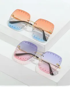 Detail of rimless gradient sunglasses with unique hollow circular cutout lens edges