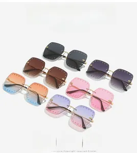 Frameless oversized sunglasses with hollow edge design and gradient lenses in six colors