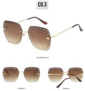Three-angle view of rimless gradient sunglasses with hollow-out details and metal studs