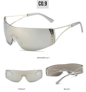 Detail of Y2K rimless shield sunglasses with rhinestone stars and silver mirror lenses